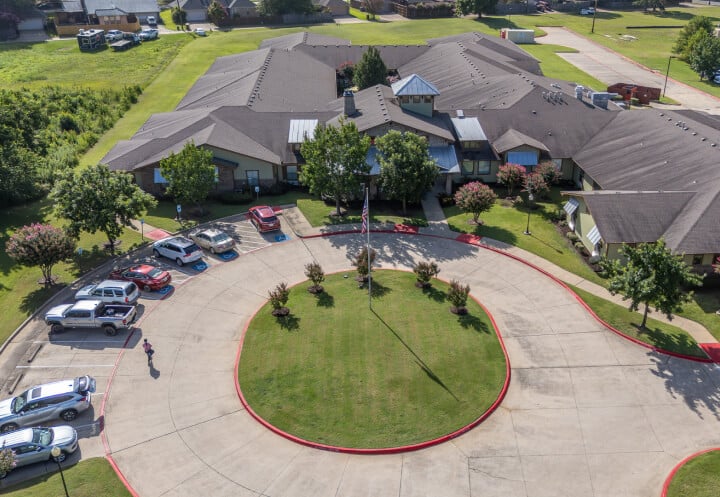 Aerial View of Campus with Circular Driveway for Seniors at Assisted Living Facility Aerial View of Campus with Circular Driveway for Seniors at Assisted Living Facility