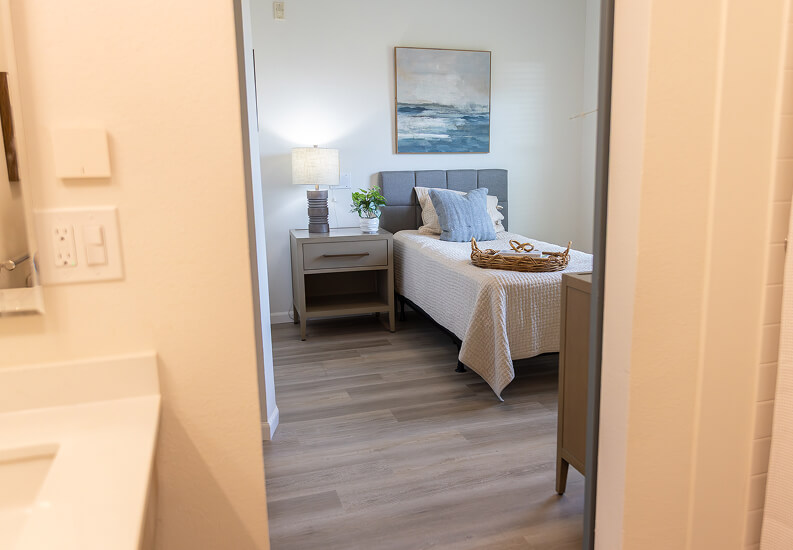 Resident Bedroom with Kitchenette View for Seniors at Assisted Living Facility Single Bedroom For Senior in Assisted Living Apartment