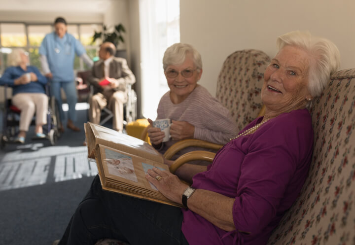 Side View of Happy and Smiling Senior Women at Memory Care Side View of Happy and Smiling Senior Women at Memory Care
